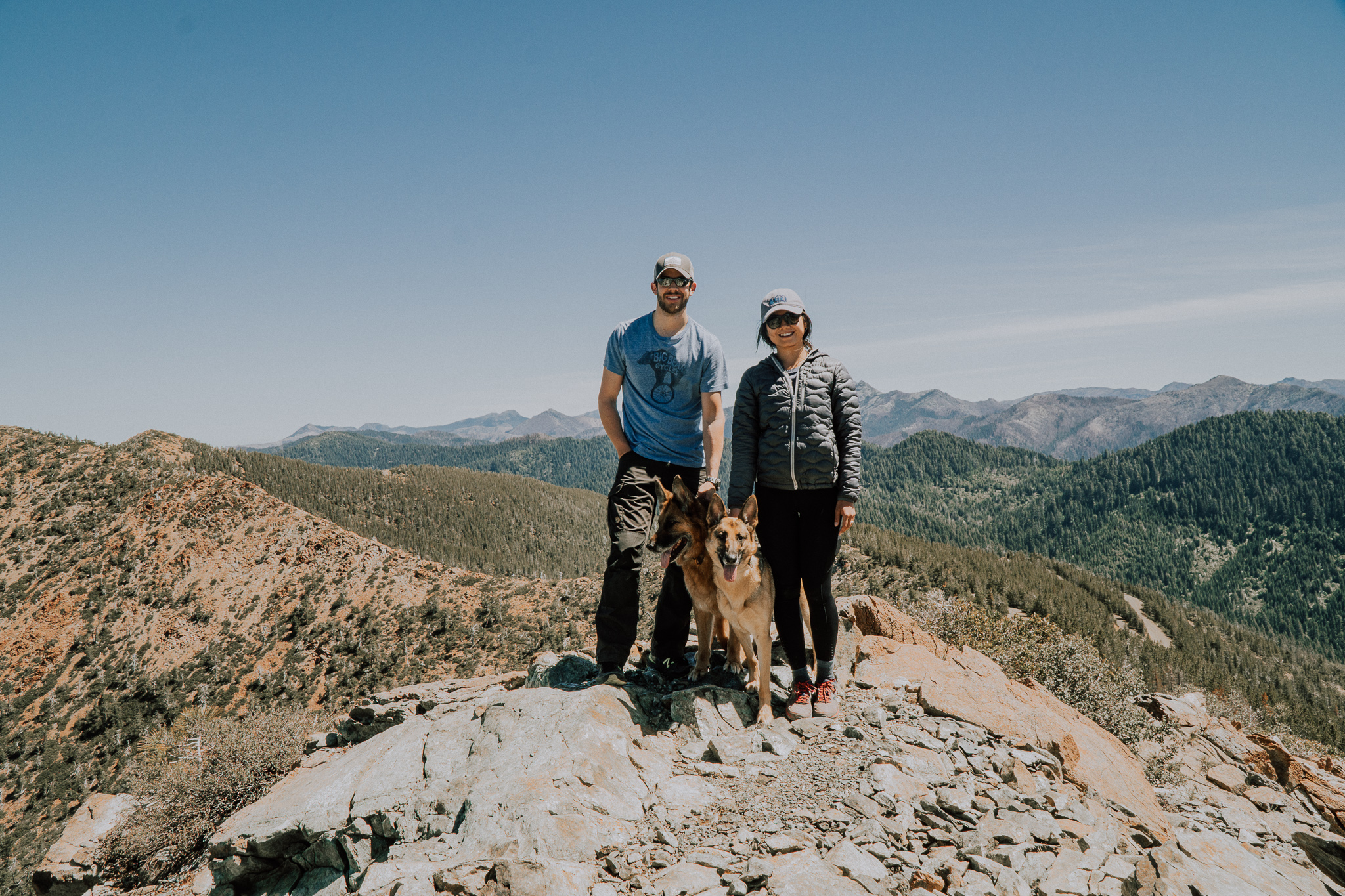 Helen and Tim Travel YouTube Travel Vloggers: See the world one mountain at a time. Helen and Tim with their two german shepherd dogs on a hike